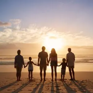 A family is watching sunset and beach